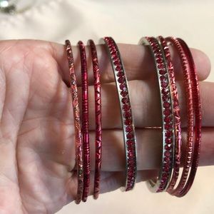 Set of Red metal bracelets